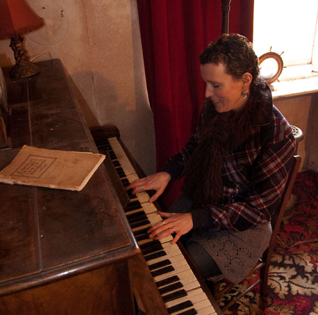 Kate Garrett at her piano